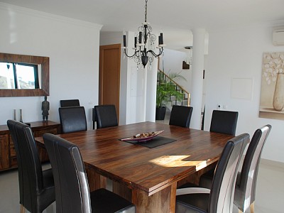 Spacious dining room with access to semi covered terrace, BBQ area and pool